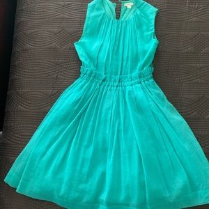 Beautiful vibrant light teal green dress